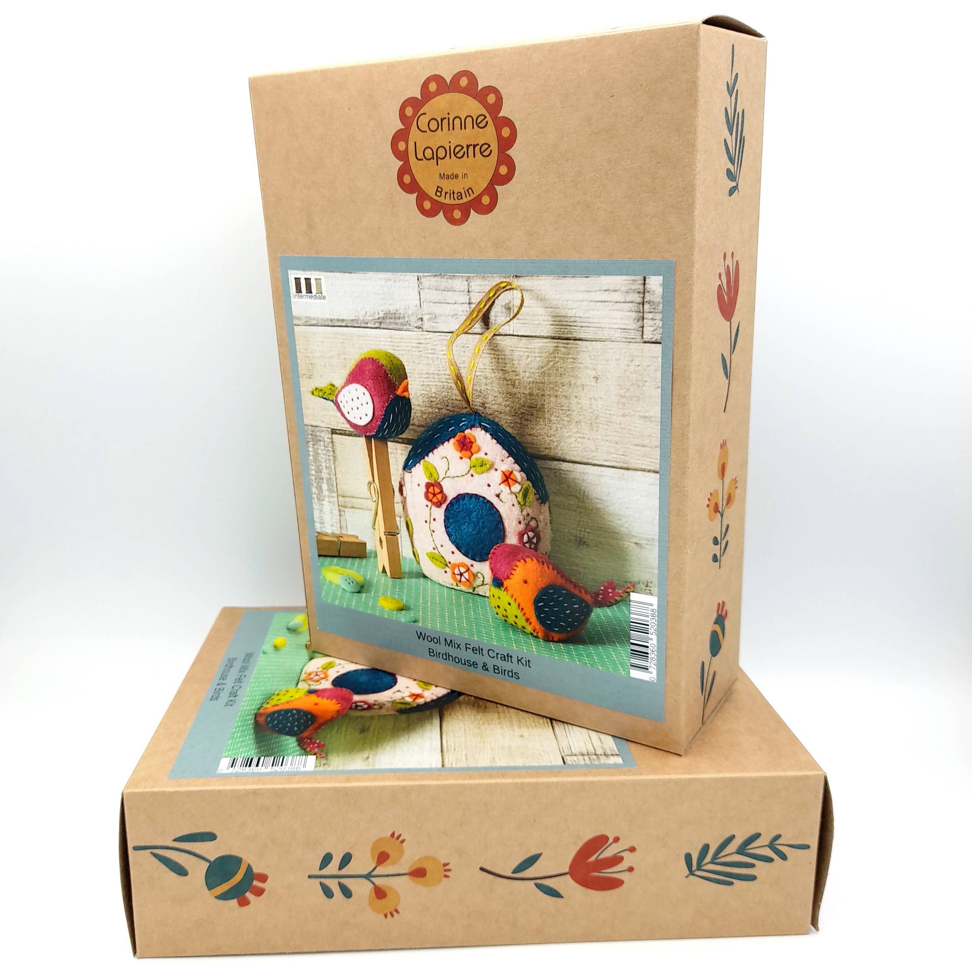 Cardboard box with Corinne Lapierre craft kit on a white background