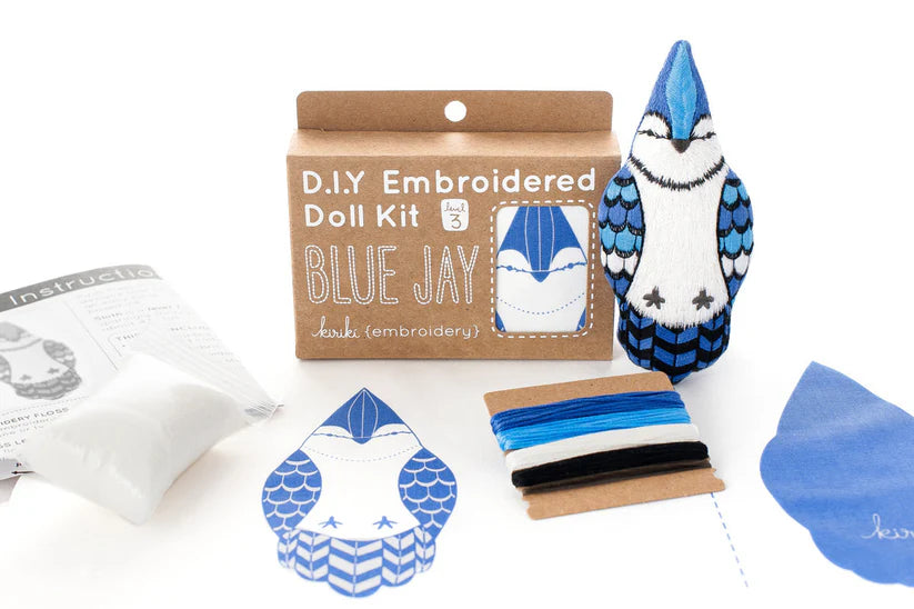 D.I.Y Embroidered Doll Kit with blue jay design on a white background